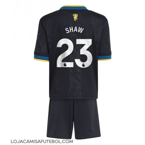 Camisa de Futebol Manchester United Luke Shaw #23 Equipamento Alternativo Infantil 2025-26 Manga Curta (+ Calças curtas)